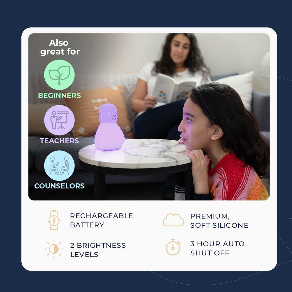 A child looks at a glowing meditation light while an adult reads nearby, highlighting benefits for beginners, teachers, and counselors.