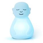 A glowing blue breathing light in the shape of a serene figure with closed eyes and a peaceful expression.