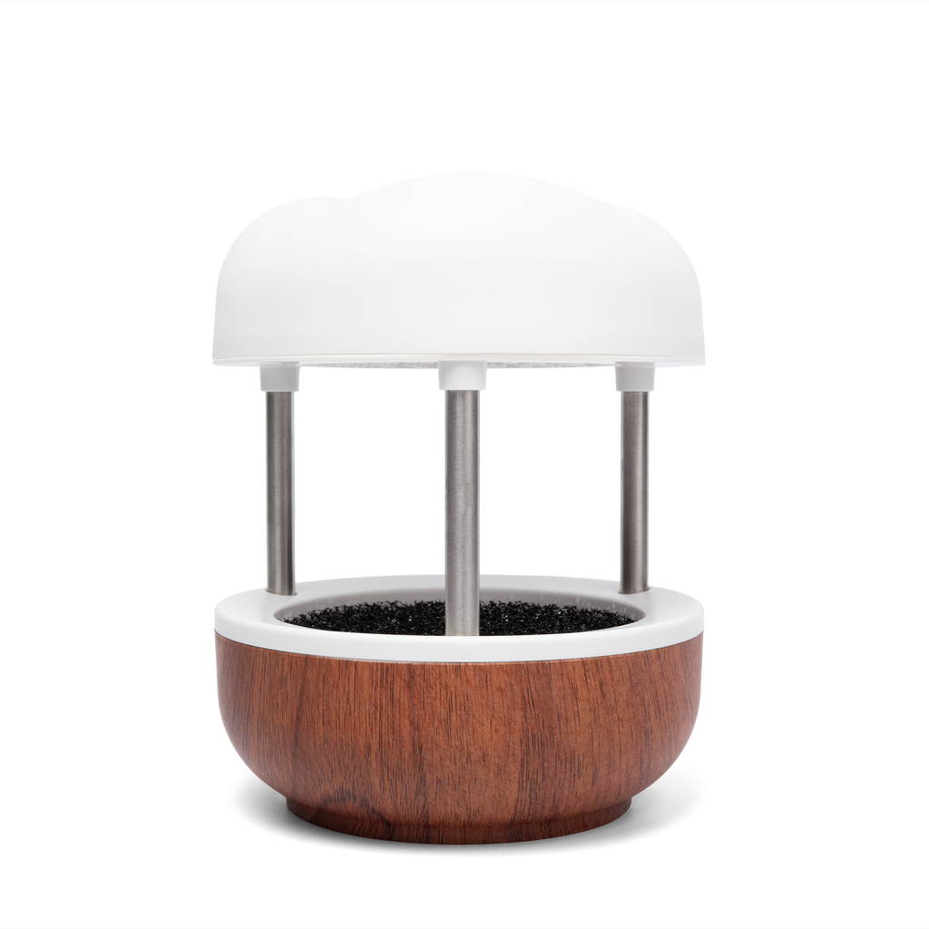 Calming Cloud Fountain with a wooden base and white top, designed to create a relaxing ambiance with water flow.