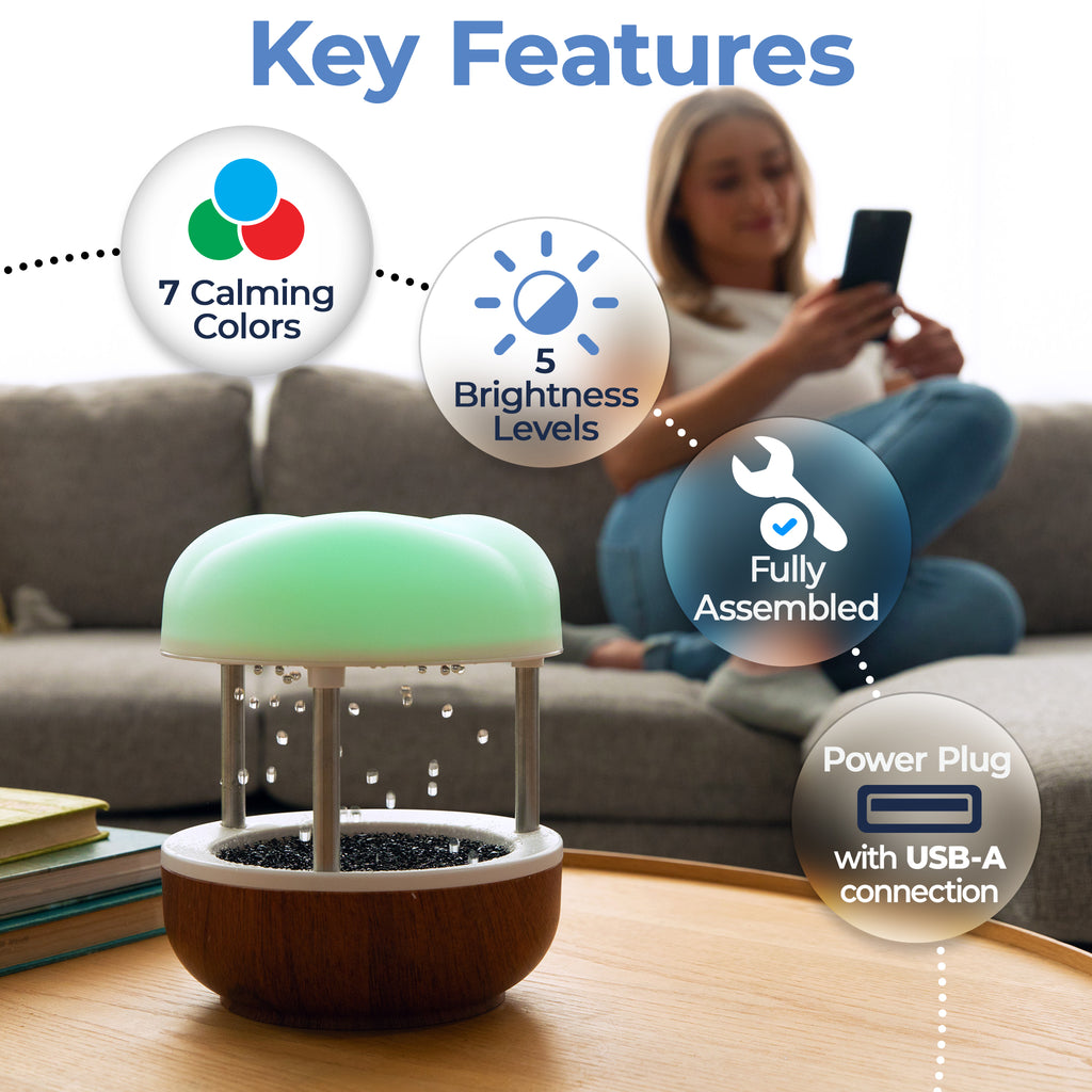 Calming Cloud Fountain with a glowing top, 7 colors, 5 brightness levels, and a USB-A connection in a relaxing home setting.