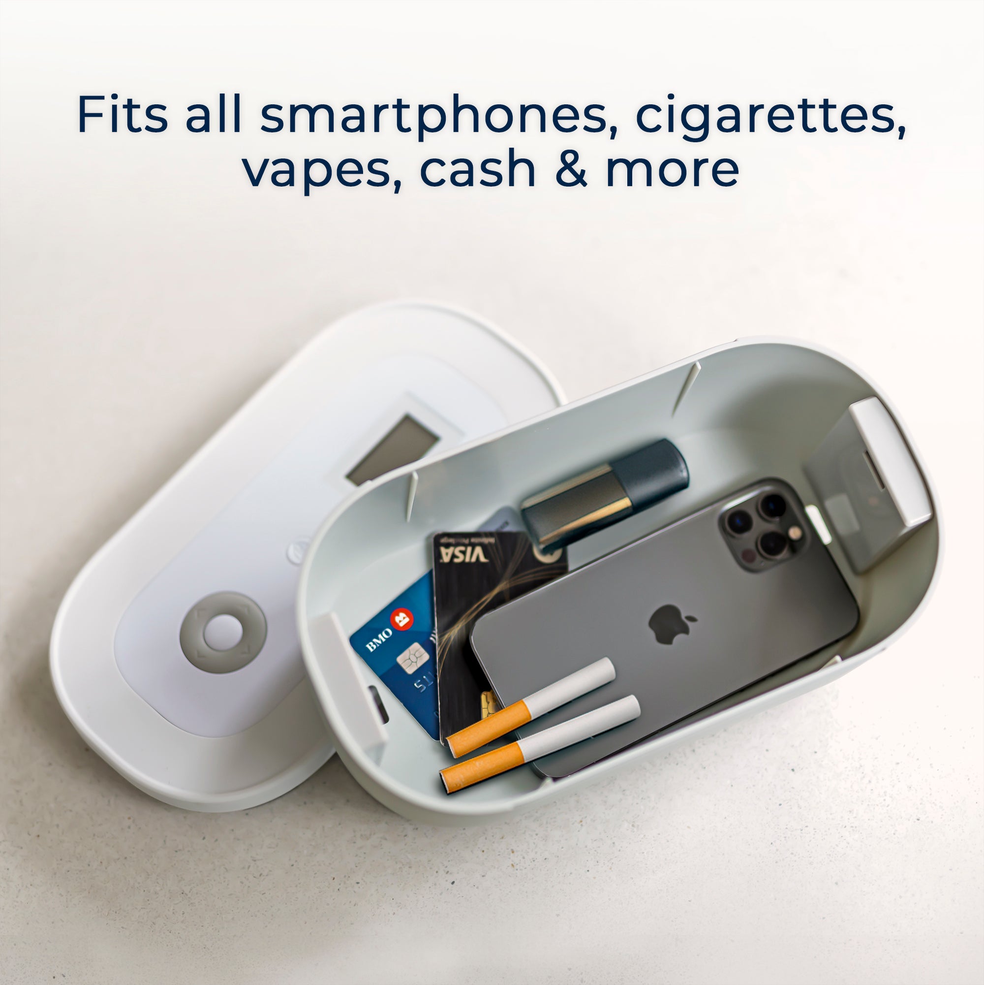 Mindsight lockbox open with phone, cigarettes, vape, and credit cards inside, showing storage capacity for small essentials