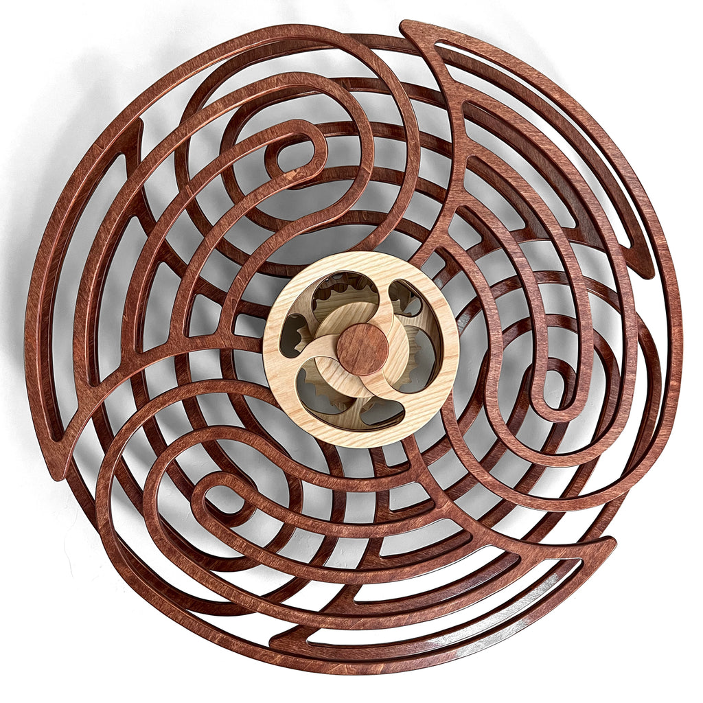 Kinetic Wall Decor with a wooden spiral maze design and a central mechanism, combining elegance and calming motion.