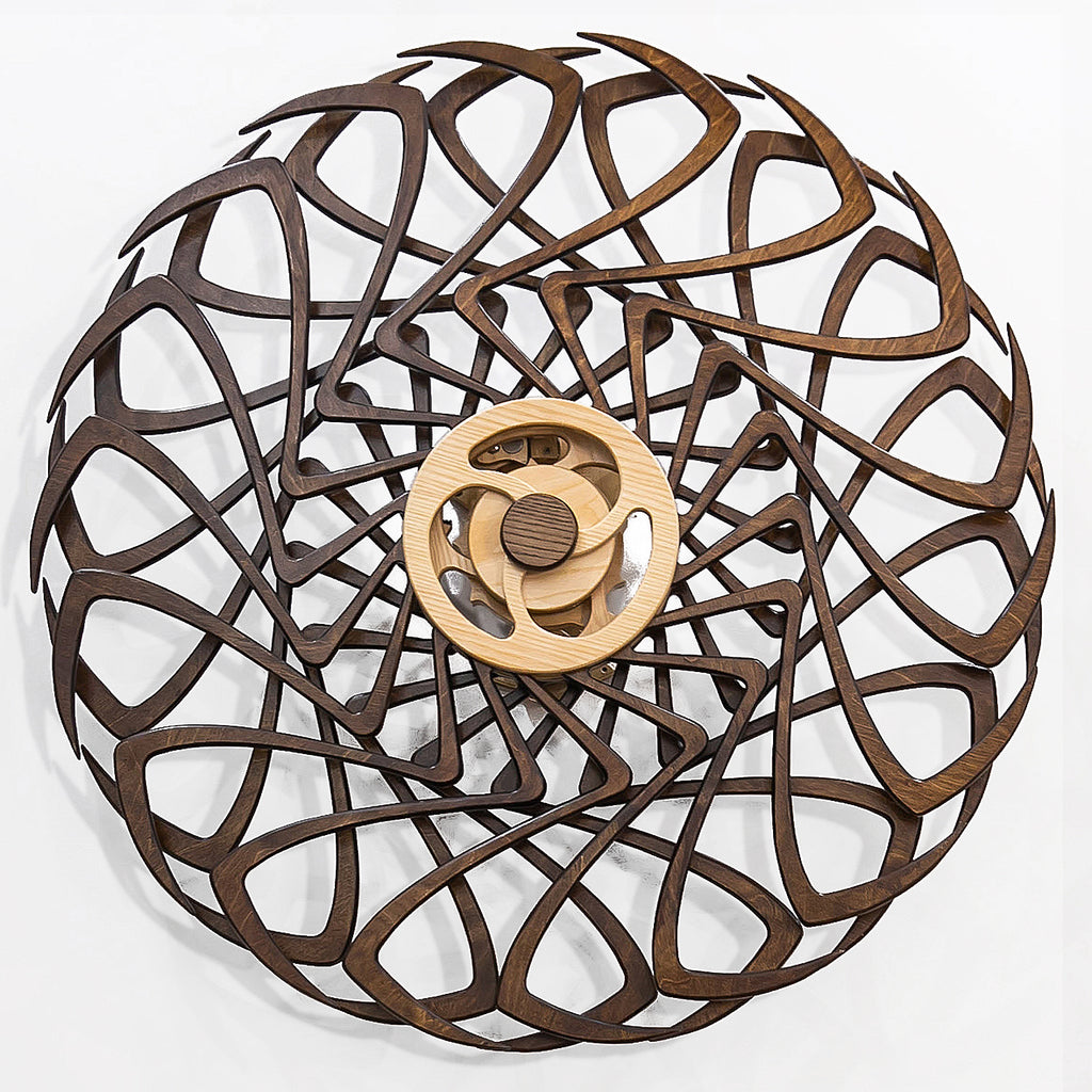 Decorative Mindsight Kinetic Wall Art with a 12-petal floral-inspired design made of interwoven wood.