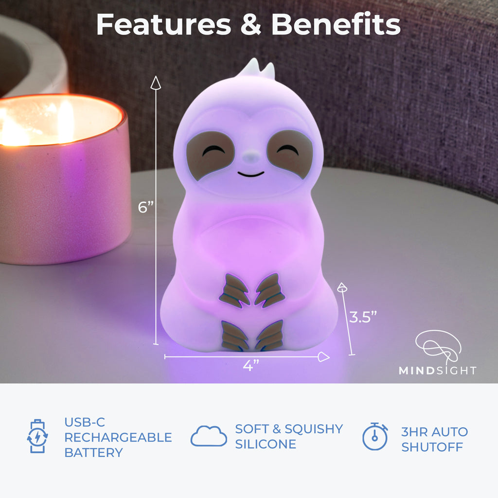 Slow It Down Sloth light, 6” tall, 4” wide, made of soft silicone with USB-C charging and a 3-hour auto shutoff, glowing purple.