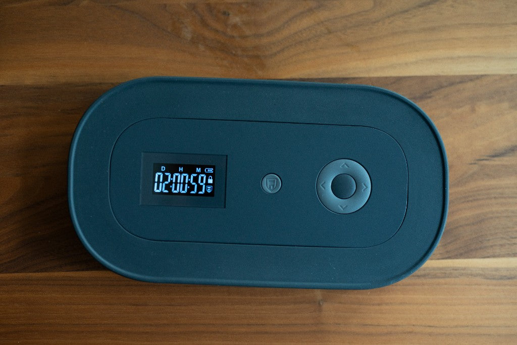 The lock box lid, with a countdown on the screen
